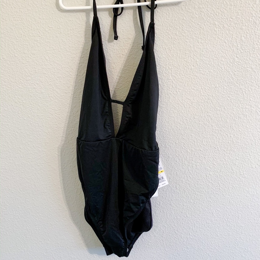 New tags attached The Bikini Lab swimsuit